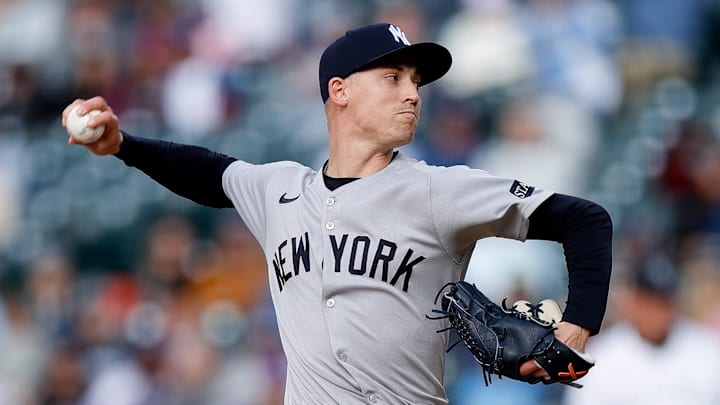 May 25, 2025; Denver, Colorado, USA; New York Yankees relief pitcher Luke Weaver (30) pitches in the ninth inning against the Colorado Rockies at Coors Field.