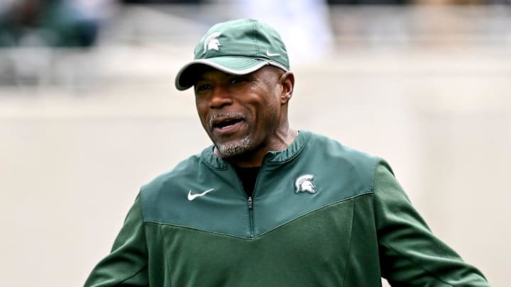 Michigan State's Michigan State's wide receivers coach Courtney Hawkins, right, talks with Jaden Mangham during the Spring Showcase on Saturday, April 20, 2024, at Spartan Stadium in East Lansing.