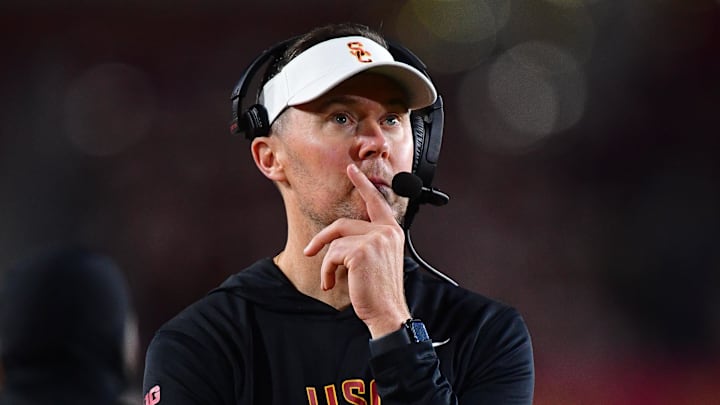 Nov 7, 2025; Los Angeles, California, USA; Southern California Trojans head coach Lincoln Riley watches game action against the Northwestern Wildcats during the second half at the Los Angeles Memorial Coliseum. Mandatory Credit: Gary A. Vasquez-Imagn Images