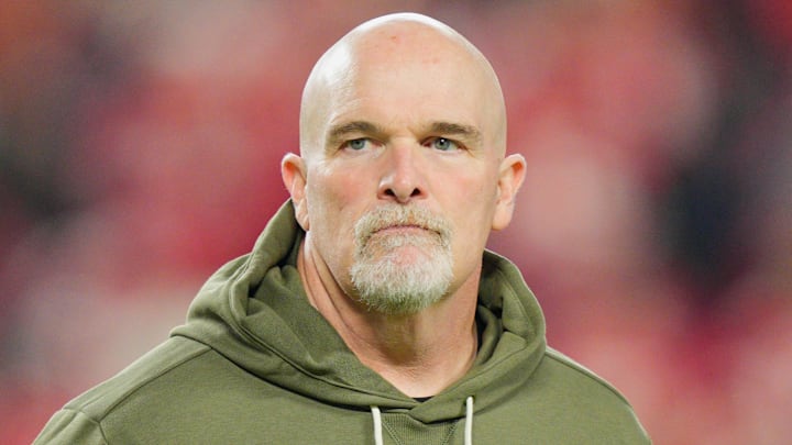 Oct 27, 2025; Kansas City, Missouri, USA; Washington Commanders head coach Dan Quinn looks on during warmups prior to the game against the Kansas City Chiefs at GEHA Field at Arrowhead Stadium. Mandatory Credit: Jay Biggerstaff-Imagn Images