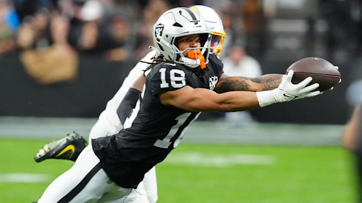 Jan 5, 2025; Paradise, Nevada, USA; Las Vegas Raiders wide receiver Jakobi Meyers (16) makes a catch against the Los Angeles Chargers during the first quarter at Allegiant Stadium. Mandatory Credit: Stephen R. Sylvanie-Imagn Images