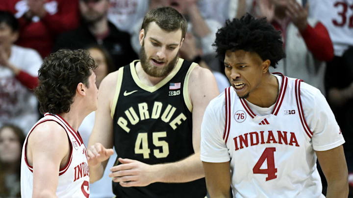 Jan 27, 2026; Bloomington, Indiana, USA; Indiana Hoosiers guard Conor Enright (5) and Indiana Hoosiers forward Sam Alexis (4) celebrate after a play against the Purdue Boilermakers during the first half at Simon Skjodt Assembly Hall.