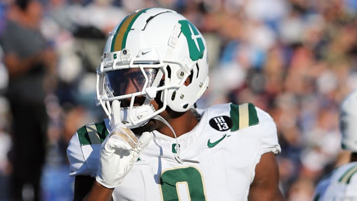  Charlotte 49ers wide receiver O'Mega Blake (9) celebrates after scoring a touchdown during the first half against the Navy Midshipmen at Navy-Marine Corps Memorial Stadium. 
