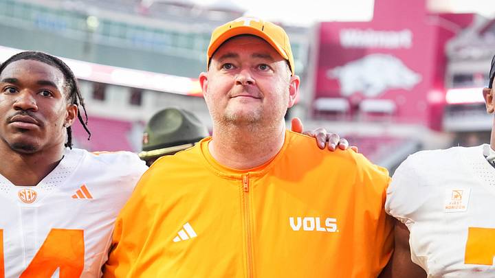 Tennessee defensive back Kayin Lee (14), Tennessee coach Josh Heupel and Tennessee linebacker Arion Carter (7) after a college football game between Tennessee and Arkansas at Donald W. Reynolds Razorback Stadium in Fayetteville, Ark., on Oct. 10, 2026.