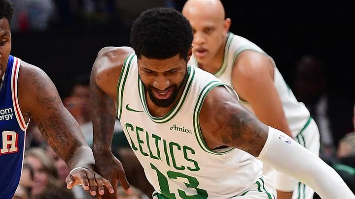 Oct 10, 2026; Boston, Massachusetts, USA; Philadelphia 76ers forward Justin Edwards (11) and Boston Celtics forward Paul George (13) battle for a loose ball during the first half at TD Garden. Mandatory Credit: Bob DeChiara-Imagn Images Oct 10, 2026; Boston, Massachusetts, USA; Philadelphia 76ers forward Justin Edwards (11) and Boston Celtics forward Paul George (13) battle for a loose ball during the first half at TD Garden. Mandatory Credit: Bob DeChiara-Imagn Images