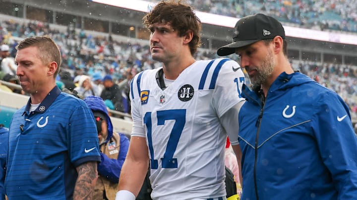 Indianapolis Colts quarterback Daniel Jones (17) leaves the field with an apparent injury against the Jacksonville Jaguars