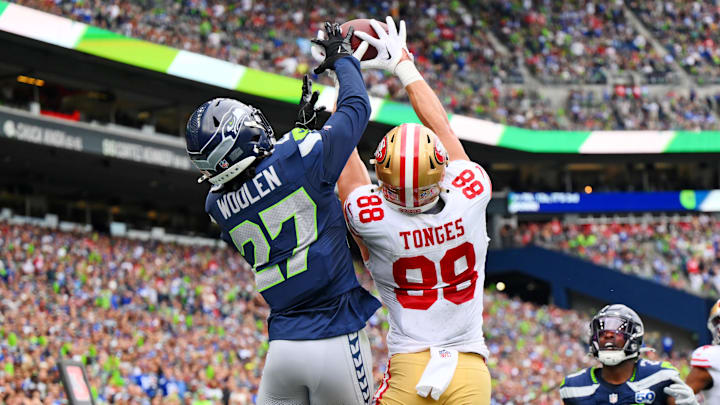 Sep 7, 2025; Seattle, Washington, USA; San Francisco 49ers tight end Jake Tonges (88) catches the ball for a touchdown being defended by Seattle Seahawks cornerback Riq Woolen (27) during the second half at Lumen Field. Mandatory Credit: Steven Bisig-Imagn Images Sep 7, 2025; Seattle, Washington, USA; San Francisco 49ers tight end Jake Tonges (88) catches the ball for a touchdown being defended by Seattle Seahawks cornerback Riq Woolen (27) during the second half at Lumen Field. Mandatory Credit: Steven Bisig-Imagn Images