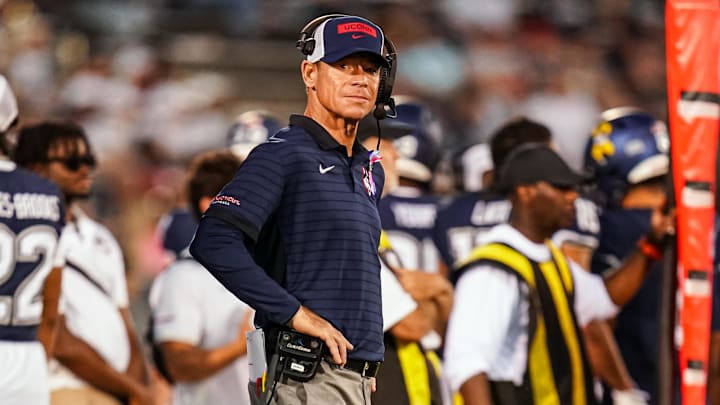 Oct 4, 2025; East Hartford, Connecticut, USA; UConn Huskies head coach Jim Mora watches from the sideline as they take on the FIU Panthers at Pratt & Whitney Stadium at Rentschler Field. Mandatory Credit: David Butler II-Imagn Images