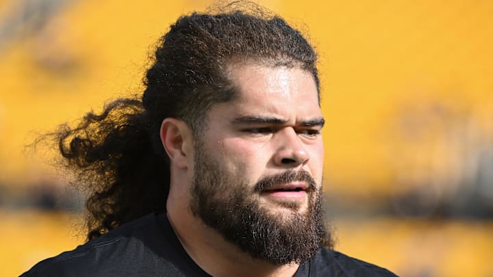 Nov 2, 2025; Pittsburgh, Pennsylvania, USA; Pittsburgh Steelers guard Isaac Seumalo warms up foe a game against the Indianapolis Colts.at Acrisure Stadium. Mandatory Credit: Barry Reeger-Imagn Images