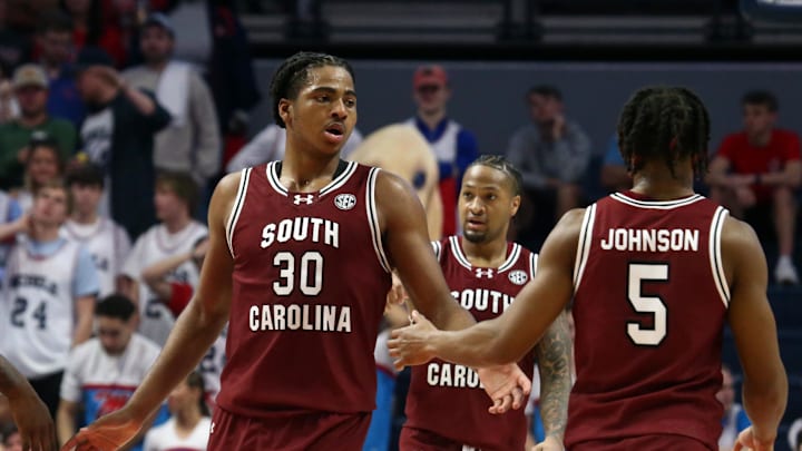 South Carolina basketball starters Collin Murray-Boyles, Meechie Johnson, and Ta'Lon Cooper