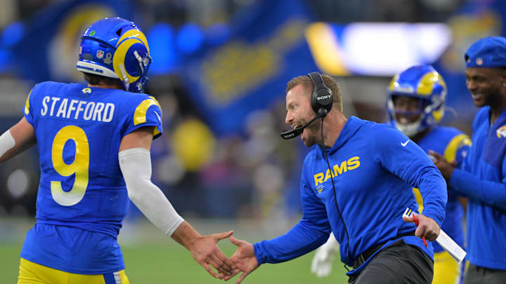 Jan 4, 2026; Inglewood, California, USA;  Los Angeles Rams head coach Sean McVay reacts with quarterback Matthew Stafford (9) after a touchdown against the Arizona Cardinals during the second half at SoFi Stadium. Mandatory Credit: Jayne Kamin-Oncea-Imagn Images