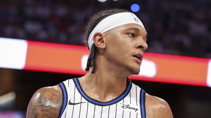 Orlando Magic forward Paolo Banchero inbounds the ball against the Miami Heat. Orlando Magic forward Paolo Banchero inbounds the ball against the Miami Heat.