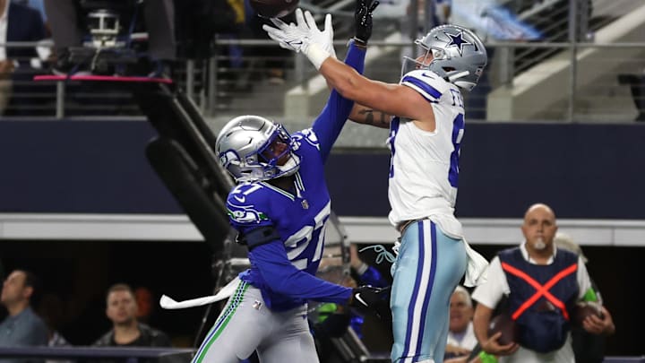 Nov 30, 2023; Arlington, Texas, USA; Seattle Seahawks cornerback Riq Woolen (27) defends a pass intended for Dallas Cowboys tight end Jake Ferguson (87) during the first half at AT&T Stadium. Mandatory Credit: Tim Heitman-Imagn Images Nov 30, 2023; Arlington, Texas, USA; Seattle Seahawks cornerback Riq Woolen (27) defends a pass intended for Dallas Cowboys tight end Jake Ferguson (87) during the first half at AT&T Stadium. Mandatory Credit: Tim Heitman-Imagn Images