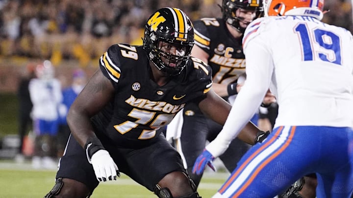 Nov 18, 2023; Columbia, Missouri, USA; Missouri Tigers offensive lineman Armand Membou (79) at the line of scrimmage against the Florida Gators during the game at Faurot Field at Memorial Stadium. Mandatory Credit: Denny Medley-Imagn Images