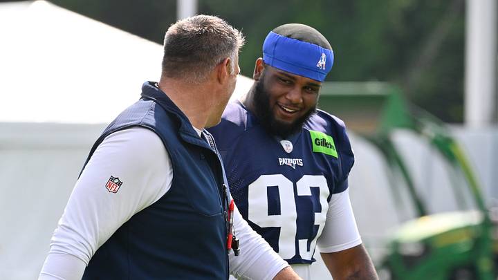 Jul 28, 2026; Foxborough, MA, USA; New England Patriots defensive lineman Leonard Taylor III (93) talks to head coach Mike Vrabel as they walk to practice for training camp at Gillette Stadium. Mandatory Credit: Eric Canha-Imagn Images Jul 28, 2026; Foxborough, MA, USA; New England Patriots defensive lineman Leonard Taylor III (93) talks to head coach Mike Vrabel as they walk to practice for training camp at Gillette Stadium. Mandatory Credit: Eric Canha-Imagn Images