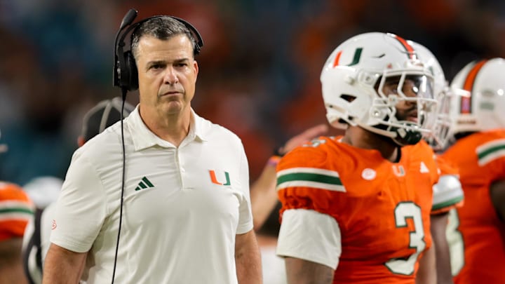 Miami Hurricanes head coach Mario Cristobal watches from the sideline against NC State Wolfpack during the third quarter at Hard Rock Stadium. Miami Hurricanes head coach Mario Cristobal watches from the sideline against NC State Wolfpack during the third quarter at Hard Rock Stadium.