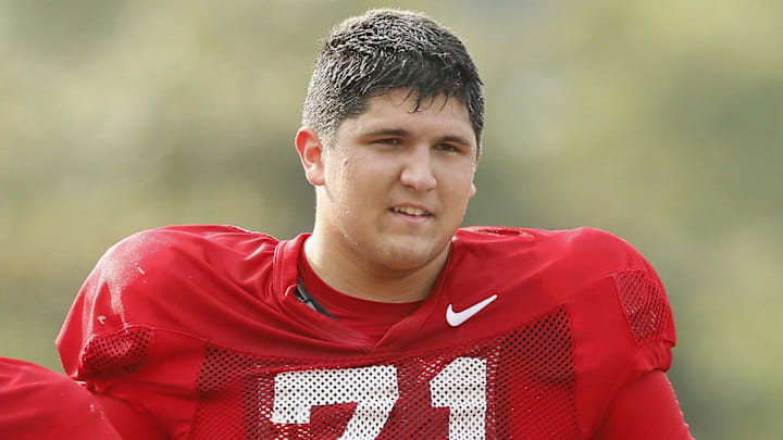 Ohio State Buckeyes offensive lineman Ben Christman (71) runs beside Ryan Smith (60) during football training camp at the Woody Hayes Athletic Center in Columbus on Tuesday, Aug. 10, 2021.