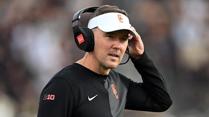 Sep 13, 2025; West Lafayette, Indiana, USA; Southern California Trojans head coach Lincoln Riley stands on the sidelines during the first quarter against the Purdue Boilermakers at Ross-Ade Stadium. Mandatory Credit: Marc Lebryk-Imagn Images Sep 13, 2025; West Lafayette, Indiana, USA; Southern California Trojans head coach Lincoln Riley stands on the sidelines during the first quarter against the Purdue Boilermakers at Ross-Ade Stadium. Mandatory Credit: Marc Lebryk-Imagn Images