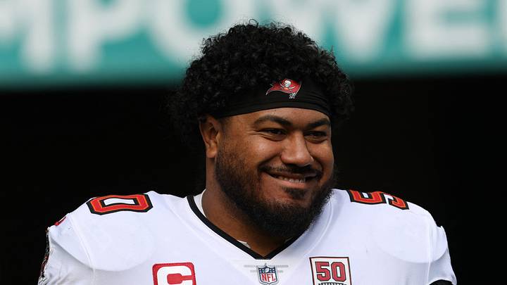 Tampa Bay Buccaneers defensive tackle Vita Vea (50) walks out for player introductions prior to a game against the Miami Dolphins Tampa Bay Buccaneers defensive tackle Vita Vea (50) walks out for player introductions prior to a game against the Miami Dolphins
