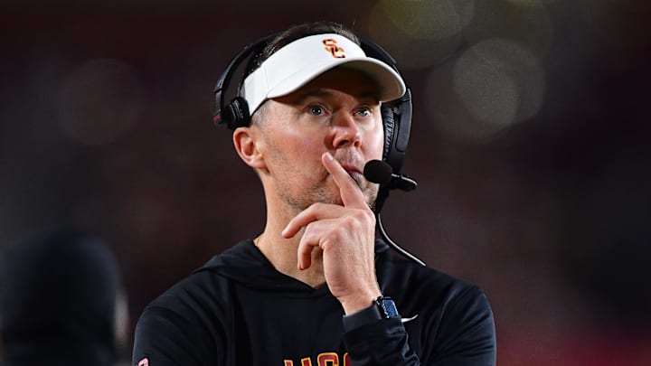 Nov 7, 2025; Los Angeles, California, USA; Southern California Trojans head coach Lincoln Riley watches game action against the Northwestern Wildcats during the second half at the Los Angeles Memorial Coliseum. Mandatory Credit: Gary A. Vasquez-Imagn Images