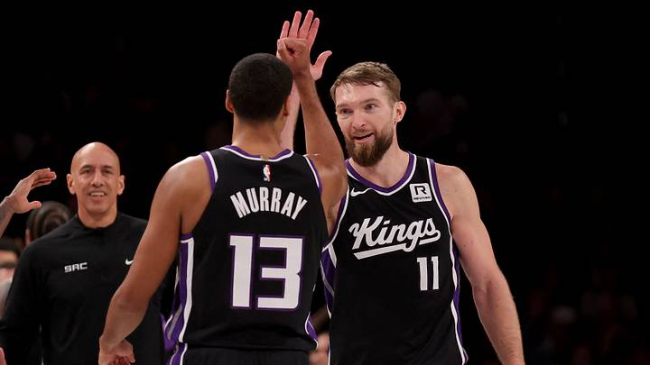 Jan 27, 2025; Brooklyn, New York, USA; Sacramento Kings forward Domantas Sabonis (11) celebrates his three point shot against the Brooklyn Nets with forward Keegan Murray (13) during the fourth quarter at Barclays Center.