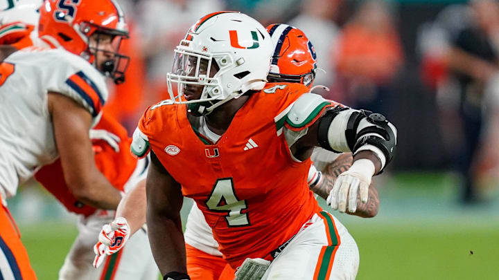 Nov 8, 2025; Miami Gardens, Florida, USA; Miami Hurricanes defensive lineman Rueben Bain Jr. (4) rushes the passer against the Syracuse Orange during the third quarter at Hard Rock Stadium. Mandatory Credit: Jeff Romance-Imagn Images