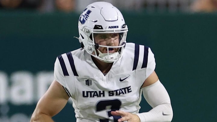 Utah State Aggies quarterback Jacob Conover (3) in action against the Hawaii Rainbow Warriors at Clarence T.C. Utah State Aggies quarterback Jacob Conover (3) in action against the Hawaii Rainbow Warriors at Clarence T.C.