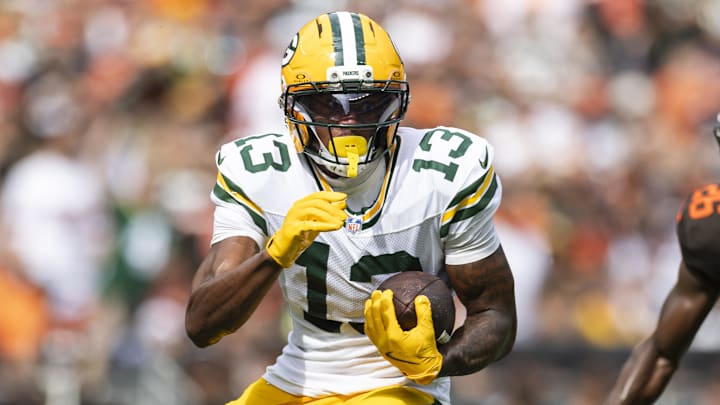 Sep 21, 2025; Cleveland, Ohio, USA; Green Bay Packers wide receiver Dontayvion Wicks (13) runs the ball against the Cleveland Browns during the third quarter at Huntington Bank Field. Mandatory Credit: Scott Galvin-Imagn Images Sep 21, 2025; Cleveland, Ohio, USA; Green Bay Packers wide receiver Dontayvion Wicks (13) runs the ball against the Cleveland Browns during the third quarter at Huntington Bank Field. Mandatory Credit: Scott Galvin-Imagn Images