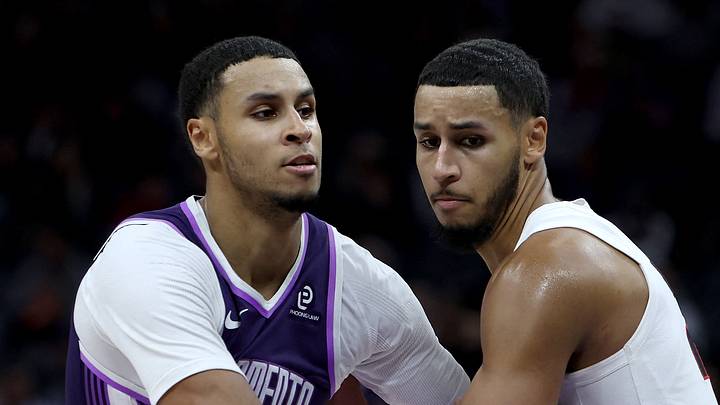 Dec 20, 2025; Sacramento, California, USA; Portland Trail Blazers forward Kris Murray (right) defends his twin brother Sacramento Kings forward Keegan Murray (left) during the fourth quarter at Golden 1 Center. Mandatory Credit: Dennis Lee-Imagn Images