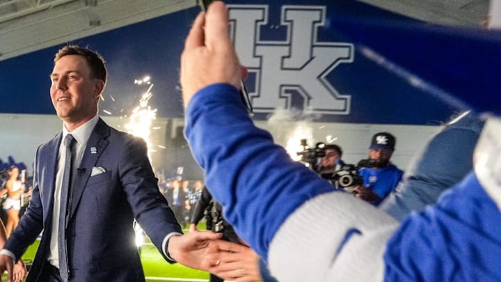 New Kentucky Wildcat head coach Will Stein arrives with wife, Darby has he is introduced at Kentucky on Wednesday, December 3, 2025