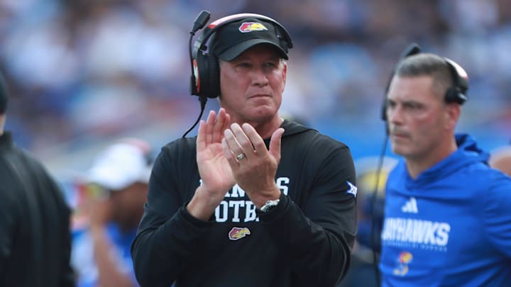 Kansas Jayhawks head coach Lance Leipold applauds on the sidelines during the first half of the game against West Virginia Mountaineers at David Booth Kansas Memorial Stadium on Sept. 20, 2025.
