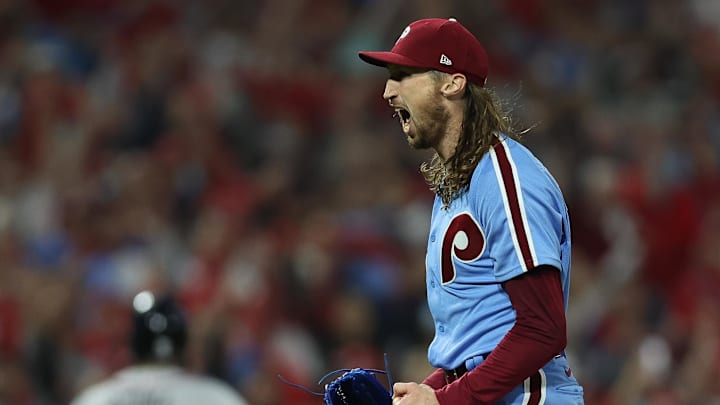 Oct 12, 2023; Philadelphia, Pennsylvania, USA; Philadelphia Phillies relief pitcher Matt Strahm (25) celebrates after striking out Atlanta Braves shortstop Vaughn Grissom (18) for the series victory in game four of the NLDS for the 2023 MLB playoffs at Citizens Bank Park.