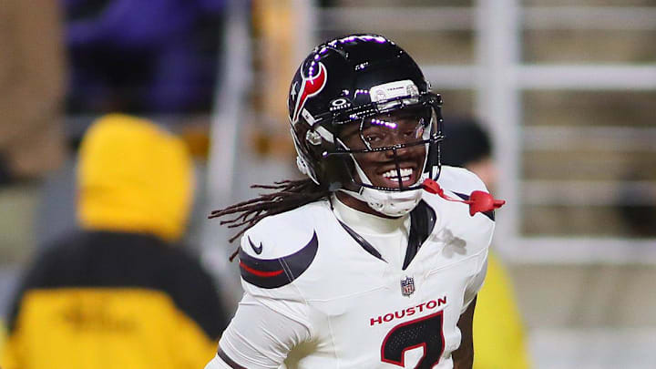 Houston Texans safety Calen Bullock celebrates scoring a touchdown during the second half.
