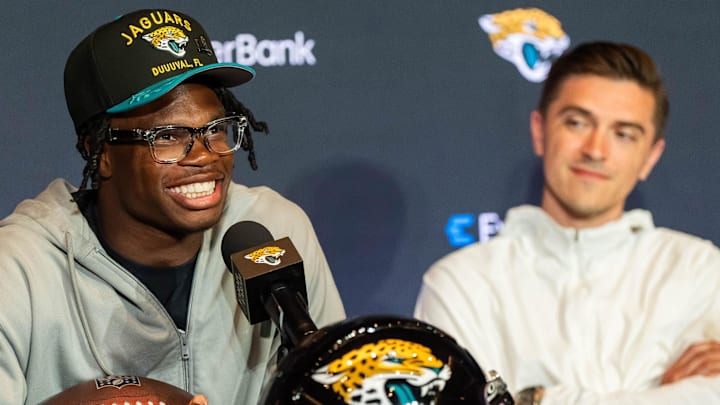 The Jacksonville Jaguars’ first-round pick, Colorado Buffaloes wide receiver and defensive back Travis Hunter, left, answers questions as General Manager James Gladstone, right, sits next to him during a press conference Friday, March 25, 2025 at Miller Electric Center in Jacksonville, Fla. [Doug Engle/Florida Times-Union]