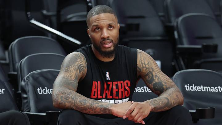 Apr 10, 2026; Portland, Oregon, USA; Portland Trail Blazers guard Damian Lillard (0) watches his teammates during warm ups before the Trail Blazers play against the LA Clippers at Moda Center. Mandatory Credit: Jaime Valdez-Imagn Images Apr 10, 2026; Portland, Oregon, USA; Portland Trail Blazers guard Damian Lillard (0) watches his teammates during warm ups before the Trail Blazers play against the LA Clippers at Moda Center. Mandatory Credit: Jaime Valdez-Imagn Images