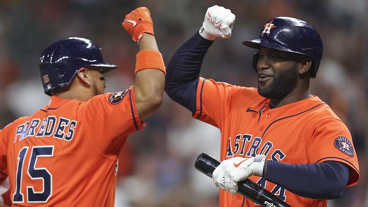 Houston Astros designated hitter Yordan Alvarez (44) celebrates with third baseman Isaac Paredes (15)