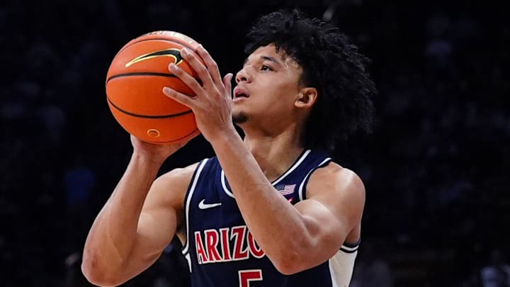 Mar 7, 2026; Boulder, Colorado, USA; Arizona Wildcats guard Brayden Burries (5) lines up a shot in the first half against the Colorado Buffaloes at the CU Events Center. Mandatory Credit: Ron Chenoy-Imagn Images