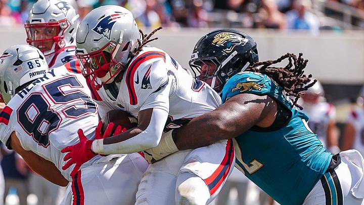 Jacksonville Jaguars defensive tackle Davon Hamilton (52) denies New England Patriots running back Rhamondre Stevenson (38) a touchdown in the second quarter during an NFL football game at EverBank Stadium, Sunday, September 27, 2026, in Jacksonville, Fla. [Doug Engle/Florida Times-Union]