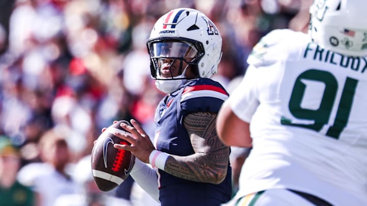 Nov 22, 2025; Tucson, Arizona, USA; Arizona Wildcats quarterback Noah Fifita (1) looks to pass the ball during the first quarter of the game against the Baylor Bears at Casino Del Sol Stadium. Mandatory Credit: Aryanna Frank-Imagn Images Nov 22, 2025; Tucson, Arizona, USA; Arizona Wildcats quarterback Noah Fifita (1) looks to pass the ball during the first quarter of the game against the Baylor Bears at Casino Del Sol Stadium. Mandatory Credit: Aryanna Frank-Imagn Images