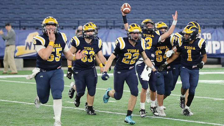 Tioga celebrated its 42-31 win over Tuckahoe in the New York State Class D football championship game on Dec. 5, 2025, at the JMA Wireless Dome in Syracuse. Tioga celebrated its 42-31 win over Tuckahoe in the New York State Class D football championship game on Dec. 5, 2025, at the JMA Wireless Dome in Syracuse.
