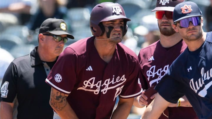 Auburn Tigers' Cooper McMurray (26) encourages Texas A&M Aggies' Jace LaViolette (17) after LaViolette got hit in the hands by a pitch as Auburn Tigers take on Texas A&M Aggies during the SEC baseball tournament at Hoover Met in Birmingham, Ala., on Thursday, May 22, 2025. Auburn Tigers' Cooper McMurray (26) encourages Texas A&M Aggies' Jace LaViolette (17) after LaViolette got hit in the hands by a pitch as Auburn Tigers take on Texas A&M Aggies during the SEC baseball tournament at Hoover Met in Birmingham, Ala., on Thursday, May 22, 2025.