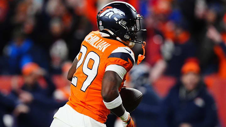 Jan 17, 2026; Denver, CO, USA; Denver Broncos cornerback Ja'quan McMillian (29) celebrates after intercepting a pass intended for Buffalo Bills wide receiver Brandin Cooks (not pictured) during overtime of an AFC Divisional Round playoff game at Empower Field at Mile High.