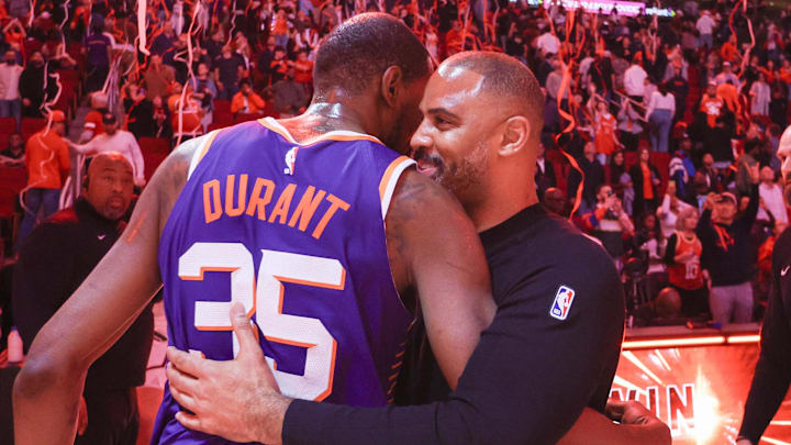 Feb 12, 2025; Houston, Texas, USA; Phoenix Suns forward Kevin Durant (35) hugs Houston Rockets head coach Ime Udoka after a game at Toyota Center. Mandatory Credit: Thomas Shea-Imagn Images