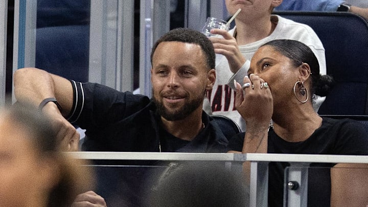Aug 9, 2025; San Francisco, California, USA; Golden State Warriors star Stephen Curry and his wife Ayesha take in a Golden State Valkyries game against the Los Angeles Sparks at Chase Center. Mandatory Credit: D. Ross Cameron-Imagn Images Aug 9, 2025; San Francisco, California, USA; Golden State Warriors star Stephen Curry and his wife Ayesha take in a Golden State Valkyries game against the Los Angeles Sparks at Chase Center. Mandatory Credit: D. Ross Cameron-Imagn Images