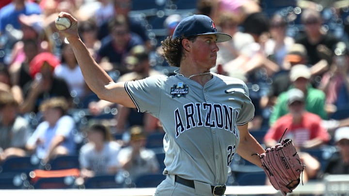 Jun 15, 2025; Omaha, Neb, USA; Arizona Wildcats starting pitcher Smith Bailey (22) throws against the Louisville Cardinals during the sixth inning at Charles Schwab Field. Mandatory Credit: Steven Branscombe-Imagn Images