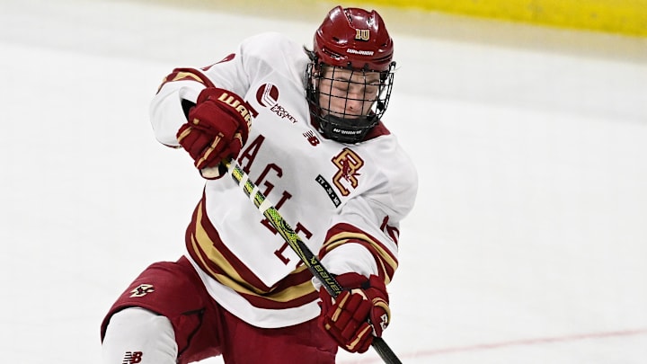 Feb 28, 2025; Chestnut Hill, MA, USA; Boston College forward James Hagens (10) shoots the puck against the University of New Hampshire Wildcats during the third period at Conte Forum. Mandatory Credit: Eric Canha-Imagn Images