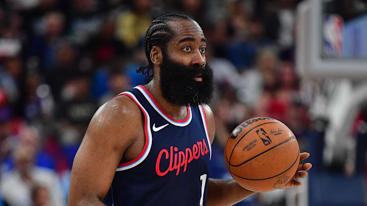 Los Angeles Clippers guard James Harden dribbles the ball. Los Angeles Clippers guard James Harden dribbles the ball.