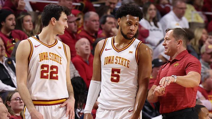 Jan 10, 2026; Ames, Iowa, USA; Iowa State Cyclones head coach T.J. Otzelberger talks with Iowa State Cyclones forward Milan Momcilovic (22) and Iowa State Cyclones forward Joshua Jefferson (5) in their game with the Oklahoma State Cowboys during the first half at James H. Hilton Coliseum. Jan 10, 2026; Ames, Iowa, USA; Iowa State Cyclones head coach T.J. Otzelberger talks with Iowa State Cyclones forward Milan Momcilovic (22) and Iowa State Cyclones forward Joshua Jefferson (5) in their game with the Oklahoma State Cowboys during the first half at James H. Hilton Coliseum.