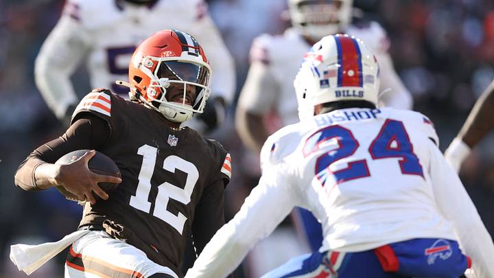 Dec 21, 2025; Cleveland, Ohio, USA;  Cleveland Browns quarterback Shedeur Sanders (12) carries the ball against the Buffalo Bills during the second half at Huntington Bank Field. Mandatory Credit: Scott Galvin-Imagn Images