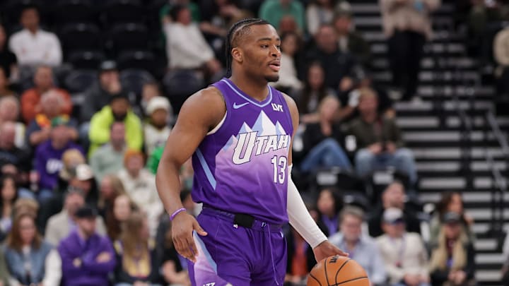 Mar 17, 2025; Salt Lake City, Utah, USA;  Utah Jazz guard Isaiah Collier (13) controls the ball during the first quarter against the Chicago Bulls at Delta Center. Mandatory Credit: Chris Nicoll-Imagn Images